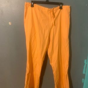 Cherokee scrub pants. Size large. Light orange/peach.